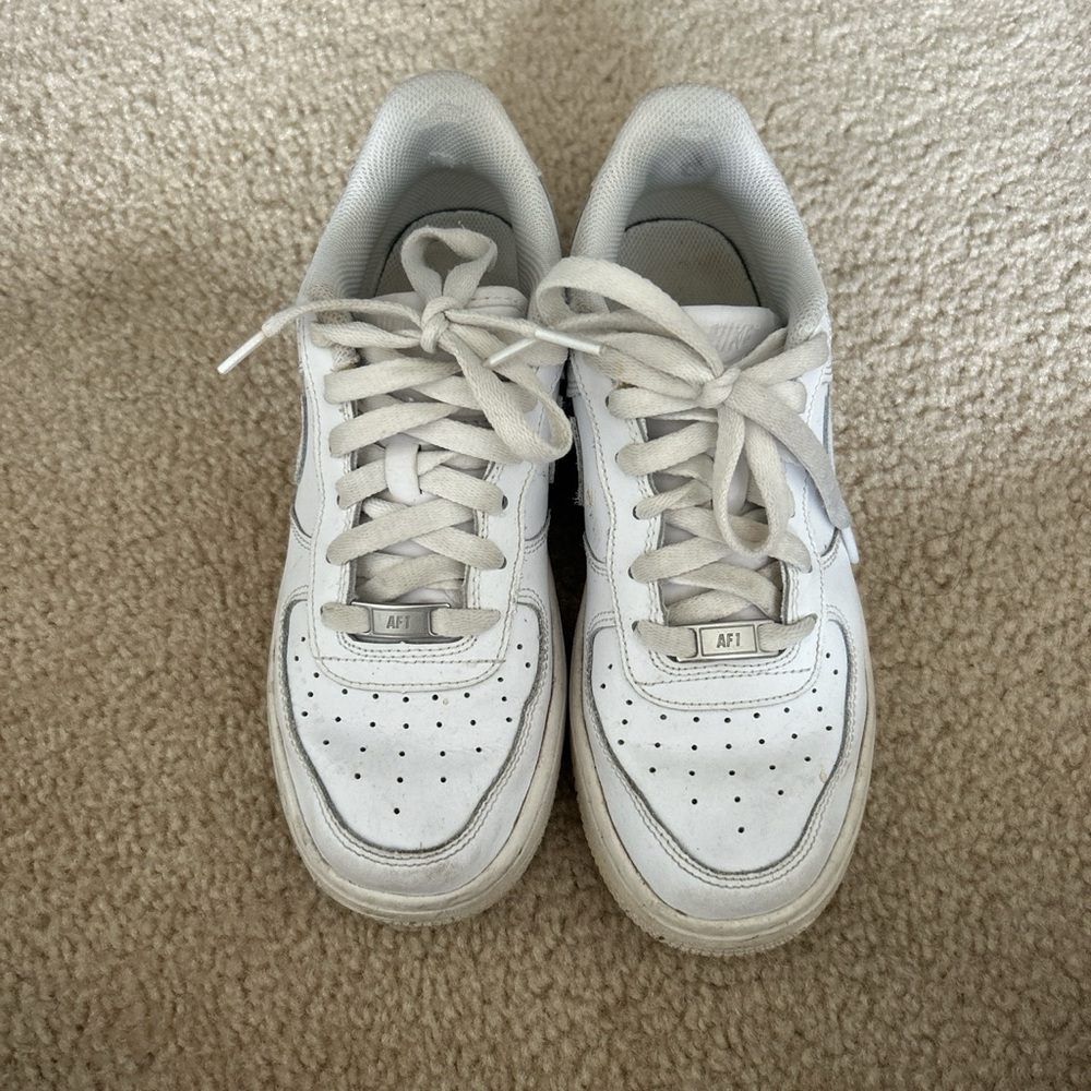All white Nike Air Force ones